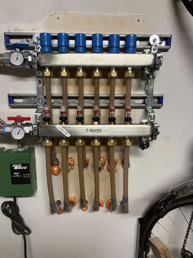 Plumber performing Gas Line Installation at a residential property in Cayuga Heights